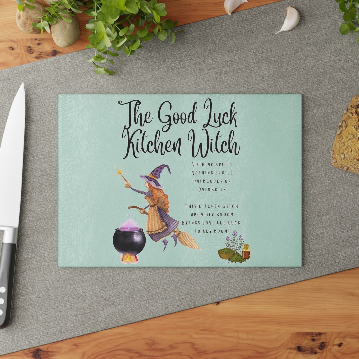 The Good Luck Kitchen Witch Glass Cutting Board