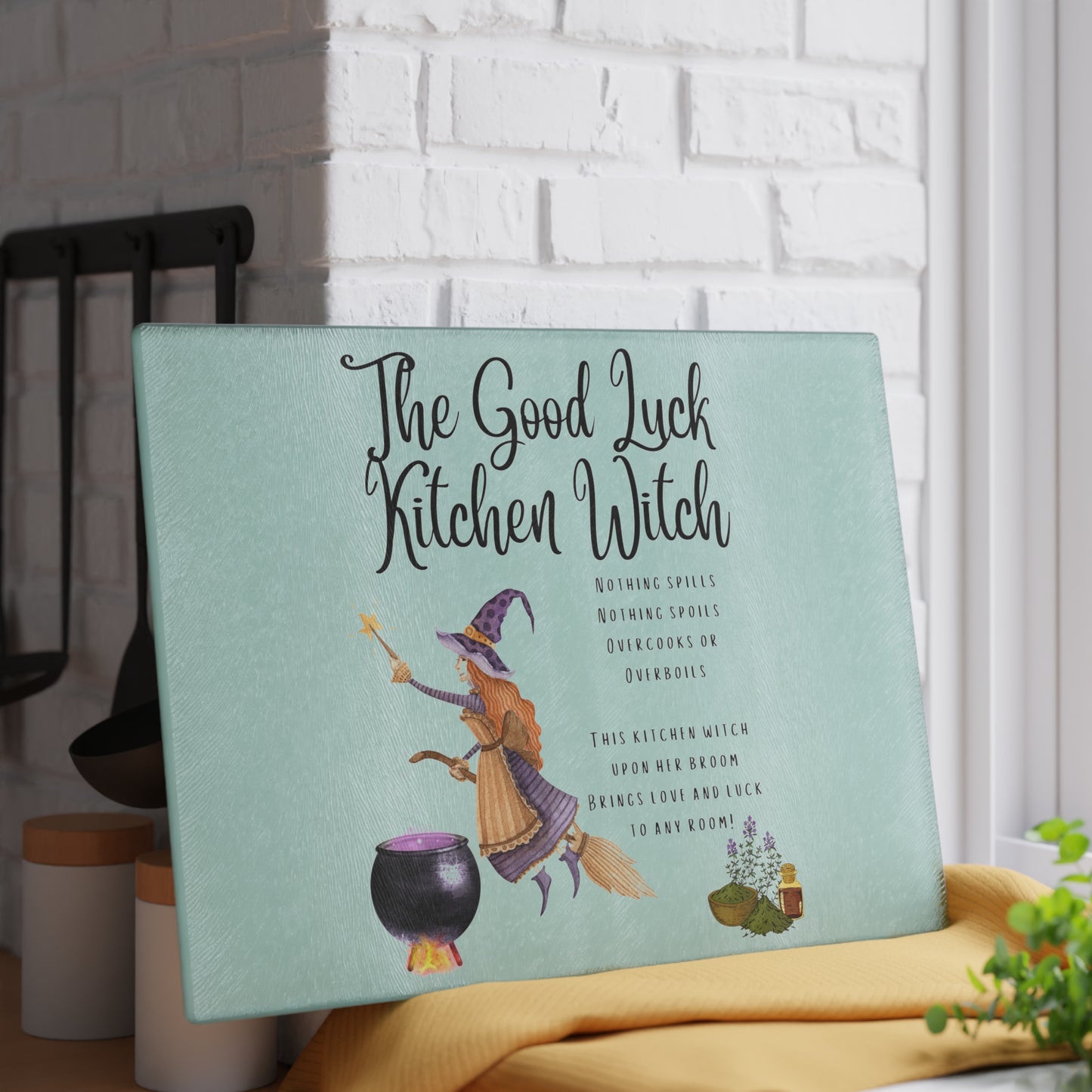 The Good Luck Kitchen Witch Glass Cutting Board